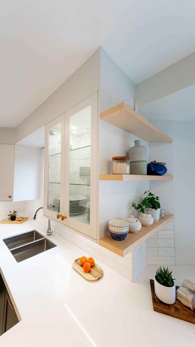 Kitchen with quartz counters and open shelving